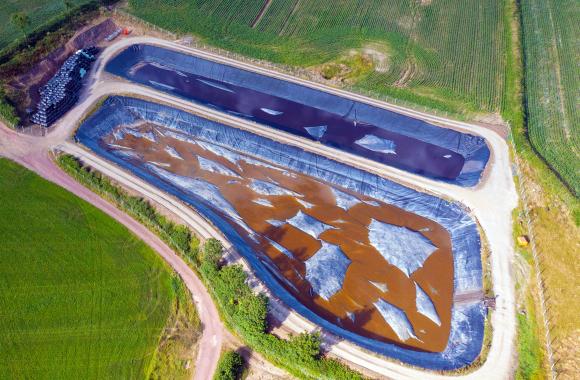 An image of a manure pit in an agricultural field