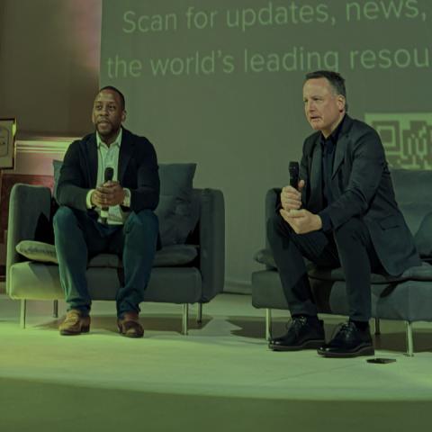Stephan Nicoleau and Jon Foley seated on stage at SF Climate Week